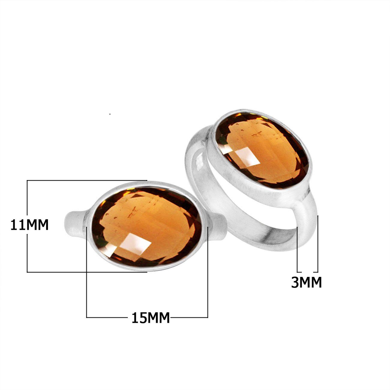 Handmade Sterling Silver ring with twin oval Citrine Quartz stones, polished Bali artisan design.