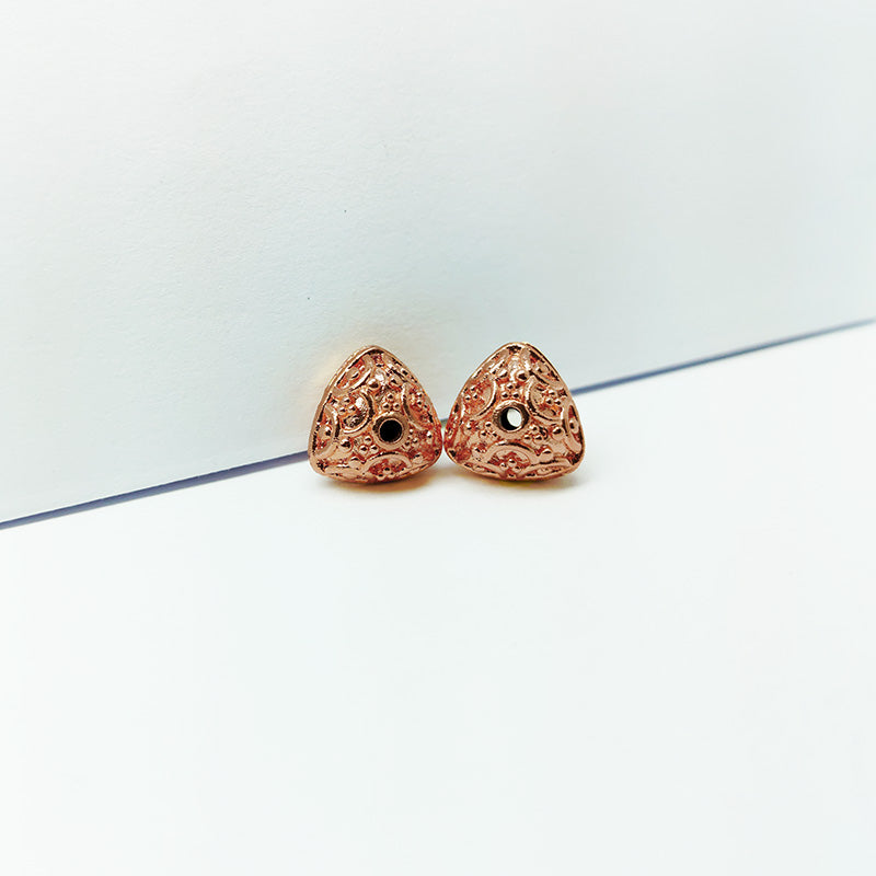 Rose Gold handcrafted round jewelry bead from India with decorative circular detailing