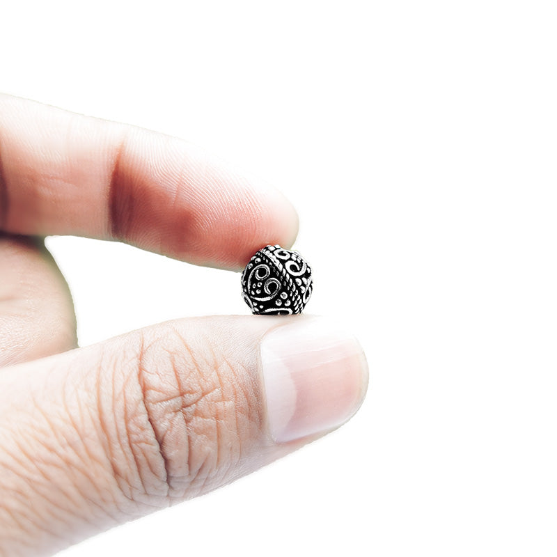 Handcrafted silver overlay bead from India featuring an antique engraved design for elegant jewelry creations.