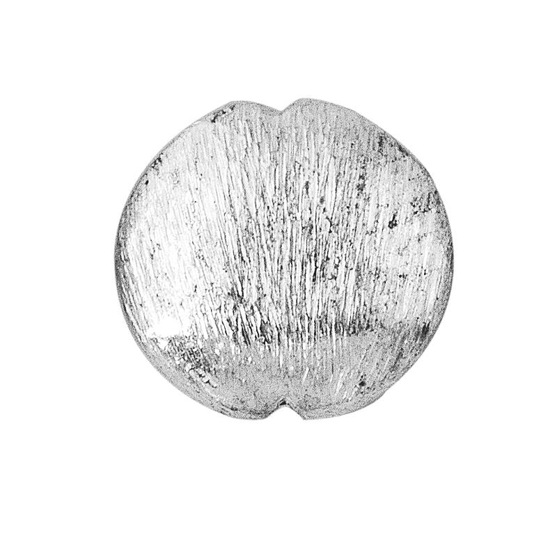 Modern silver and copper round decorative accent handcrafted in India with textured silver finish