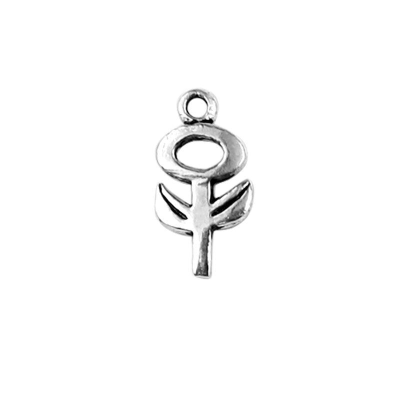 Polished silver overlay artistic symbol pendant crafted from silver overlay over copper featuring circular and leaf accents in India.