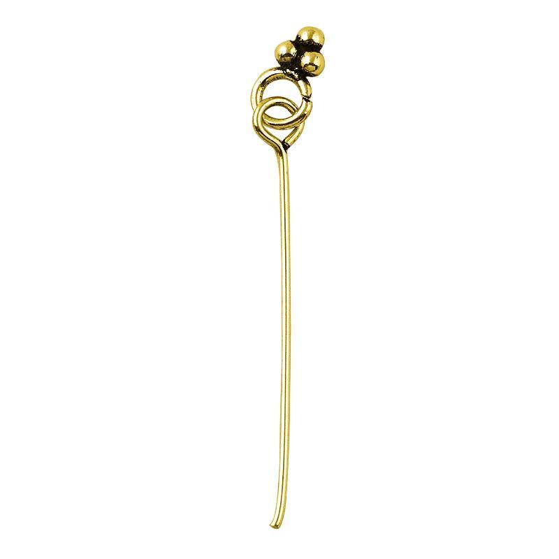Artistic 18K gold overlay granulated eye pin handcrafted in India.
