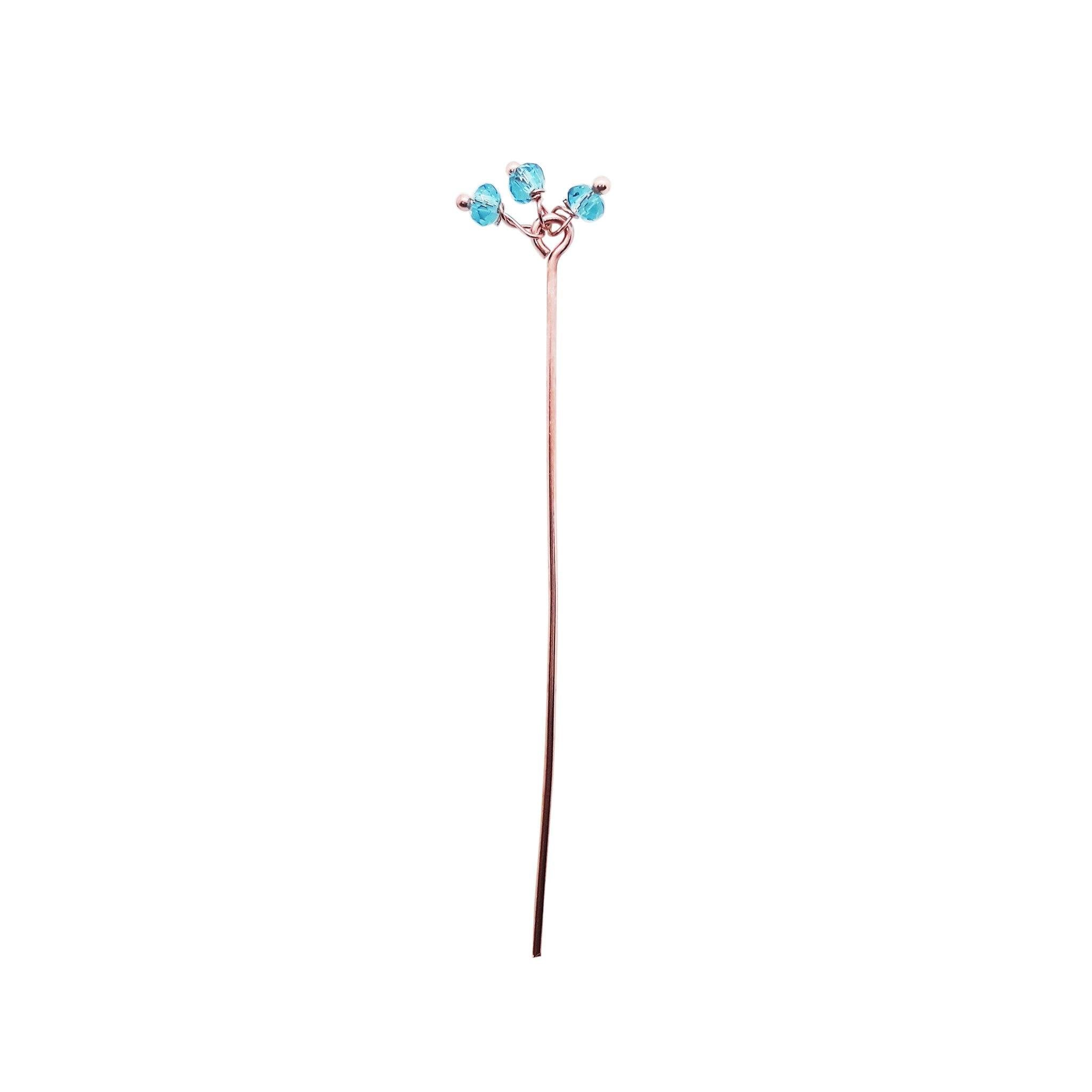 India handcrafted blue crystal quartz cluster pin with rose gold overlay over copper for retail jewelry crafting.