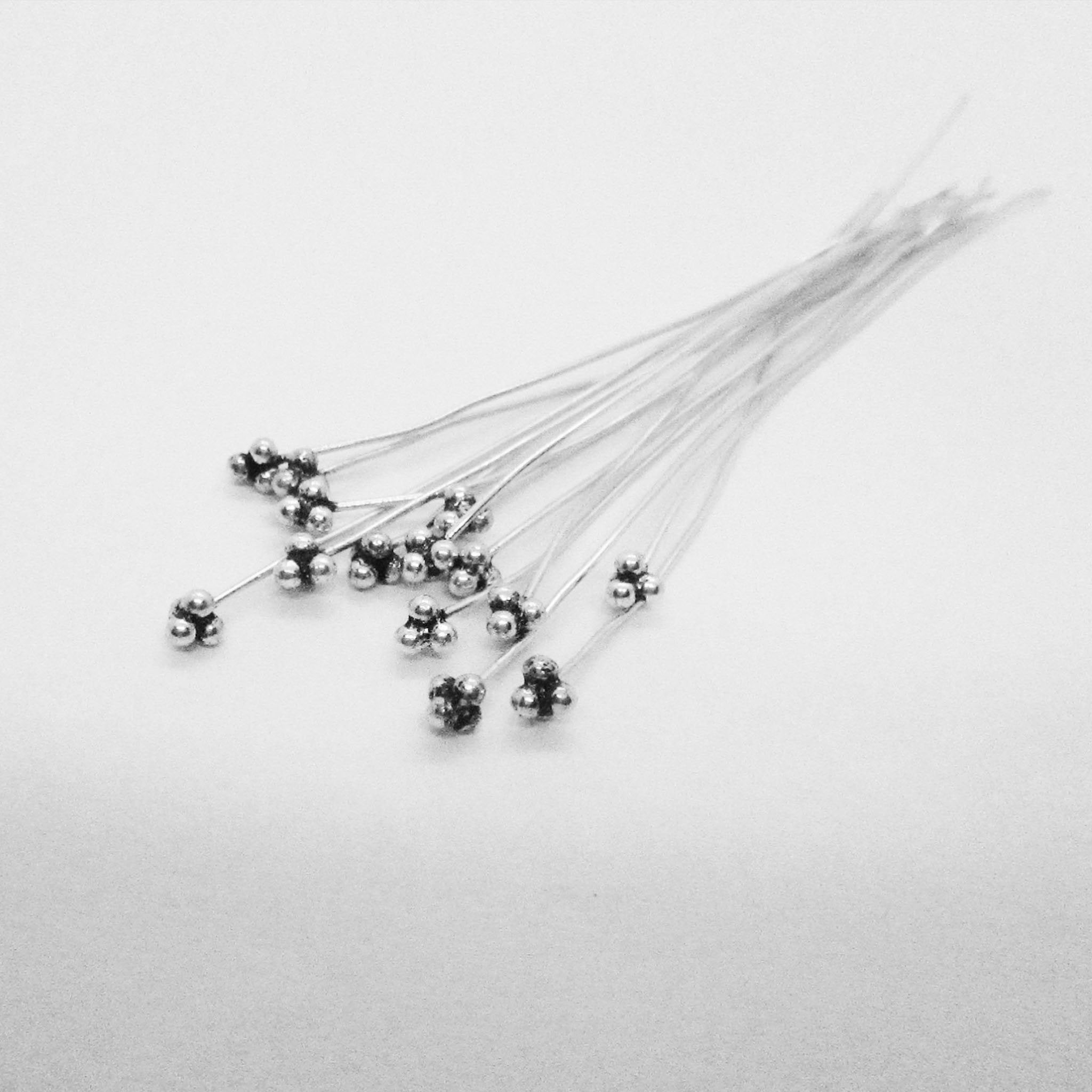 India handcrafted silver overlay over copper triple-ball design head pin for retail jewelry crafting.