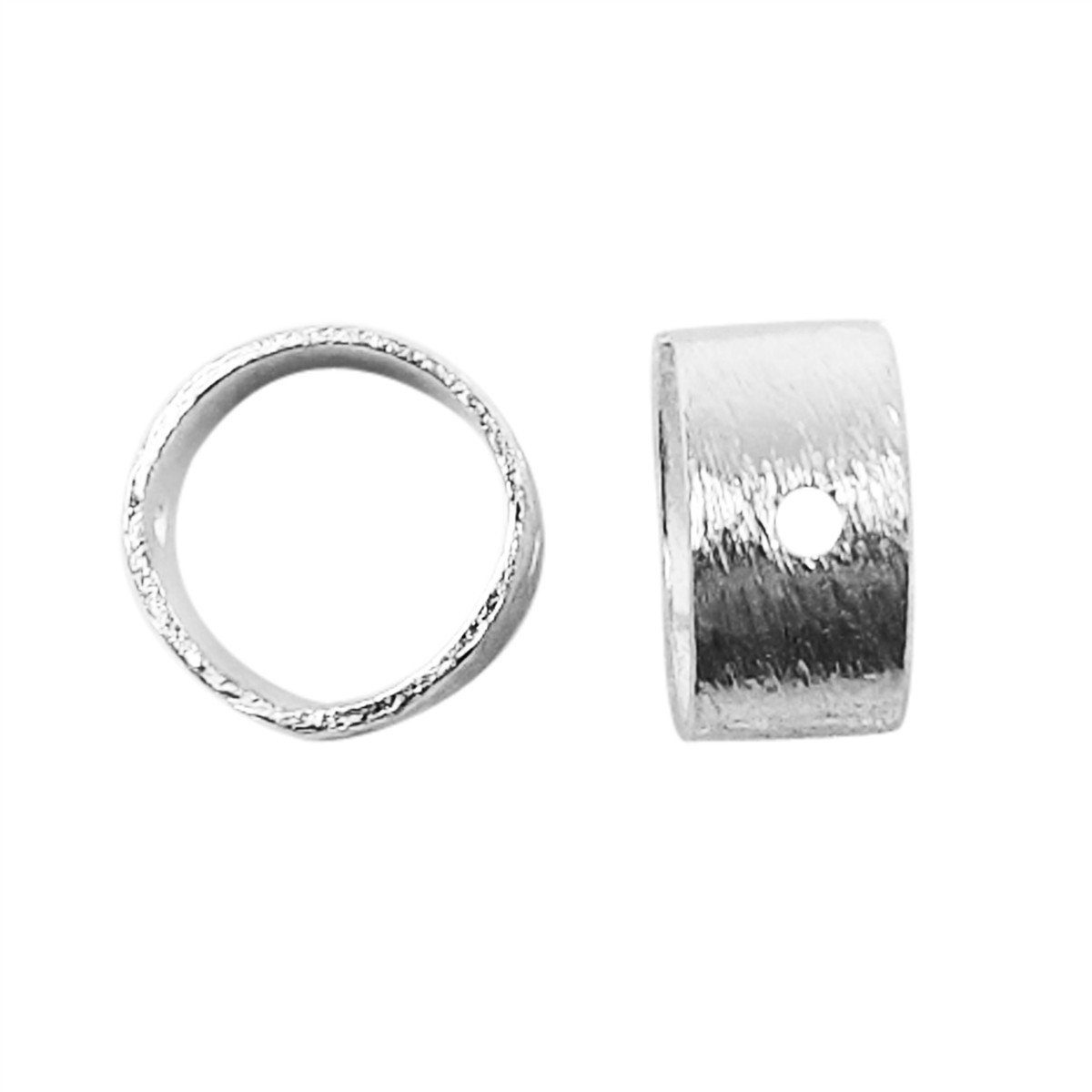 Modern wide band silver overlay over copper ring with subtle center detail and handcrafted finish made in India